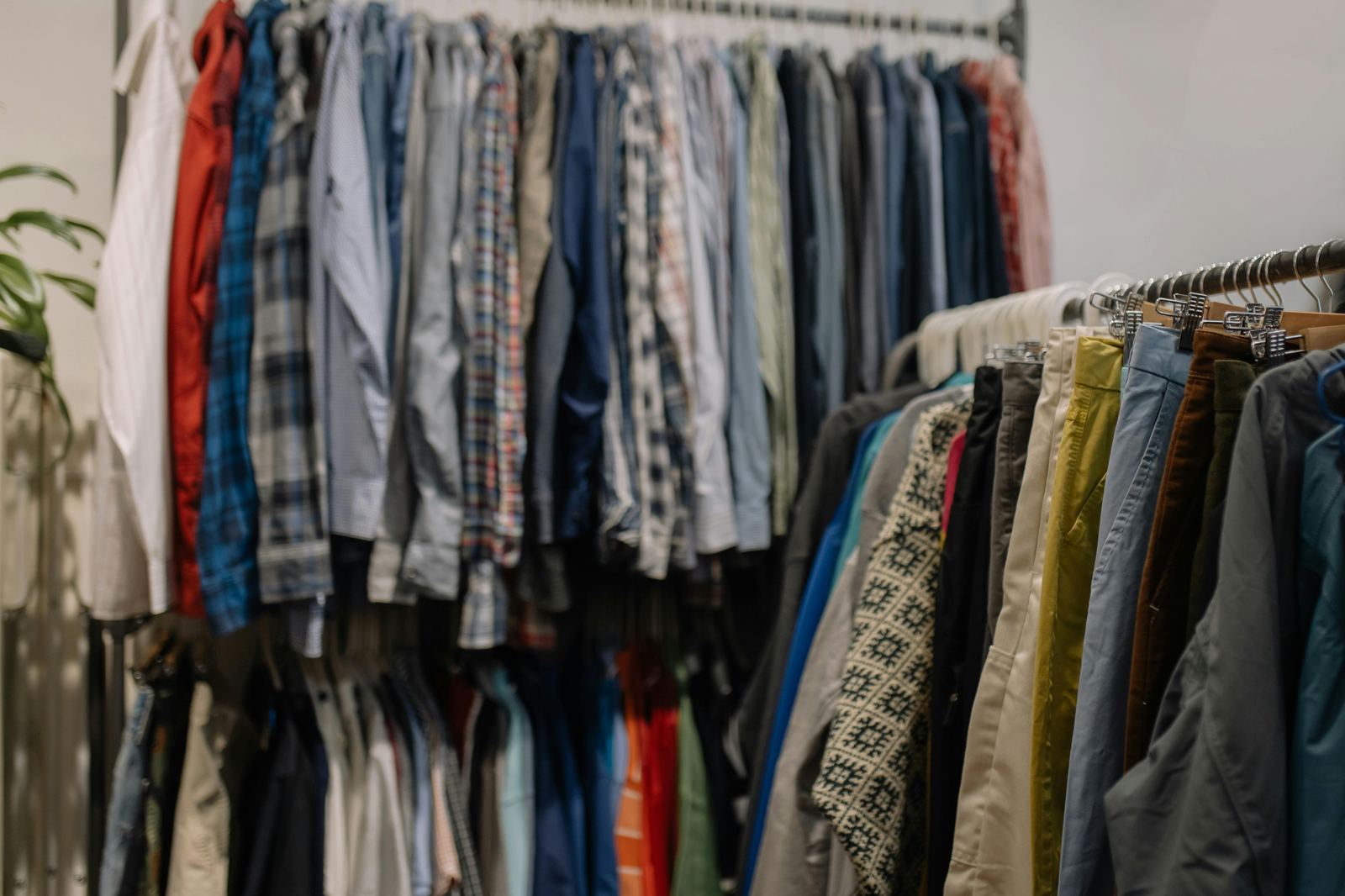 Colourful pre-loved clothing on racks